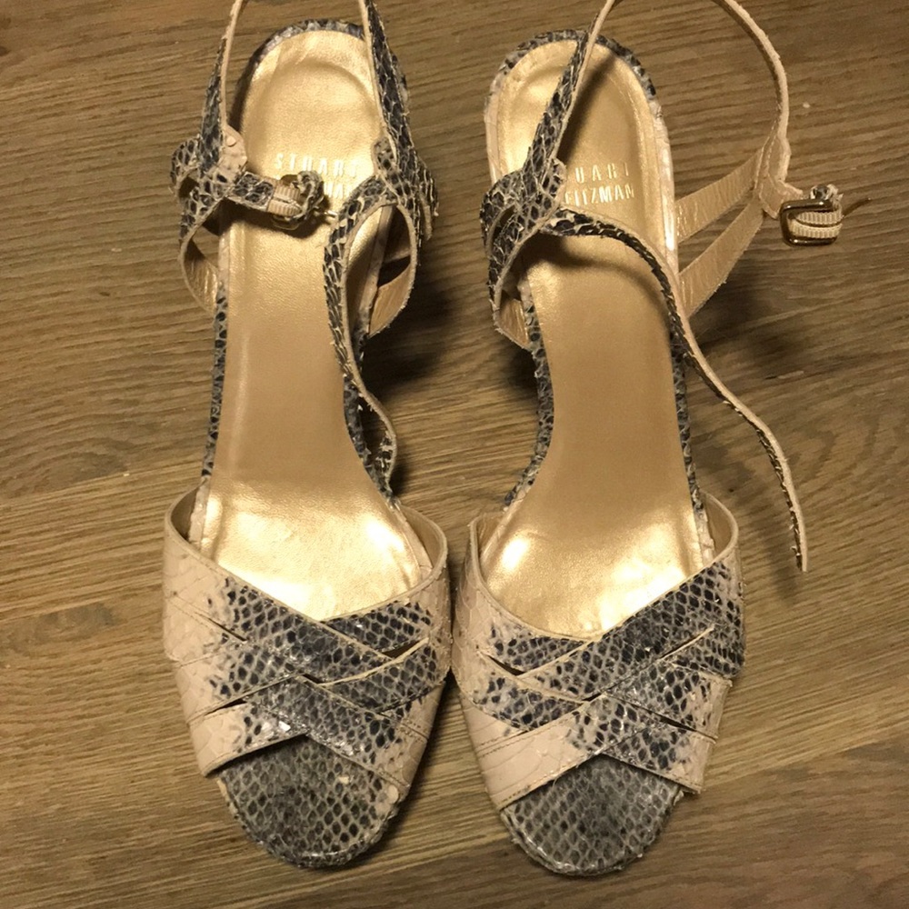 Snake-print Stuart Weitzman’s sandals